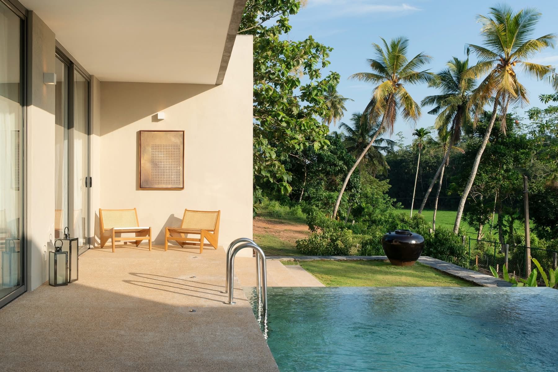 Hansa Villa infinity pool paddy field view Weligama